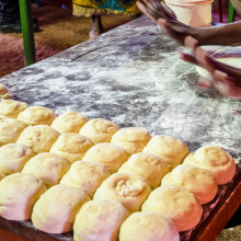 Preparing chapati in simple restaurant in Kenya, East Africa.